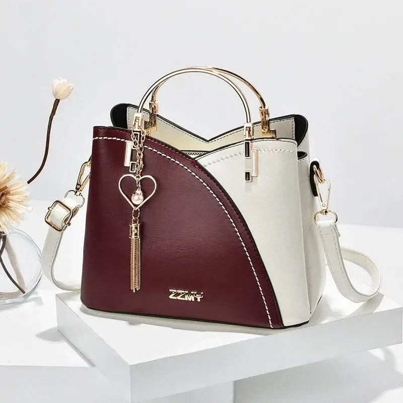 MODÉ BELLE HANDBAG